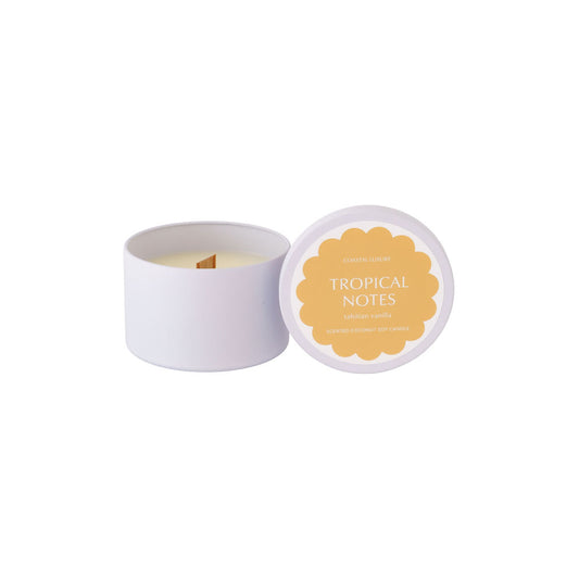 Tropical Notes Tahitian Vanilla travel tin candle with minimalist design, portable coconut soy wax candle perfect for travel or gifting.