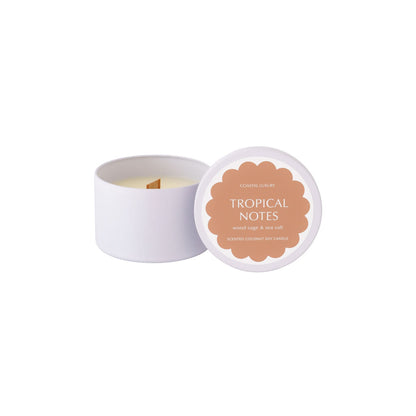 Tropical Notes Wood Sage and Sea Salt travel tin candle with minimalist design, portable coconut soy wax candle perfect for travel or gifting.